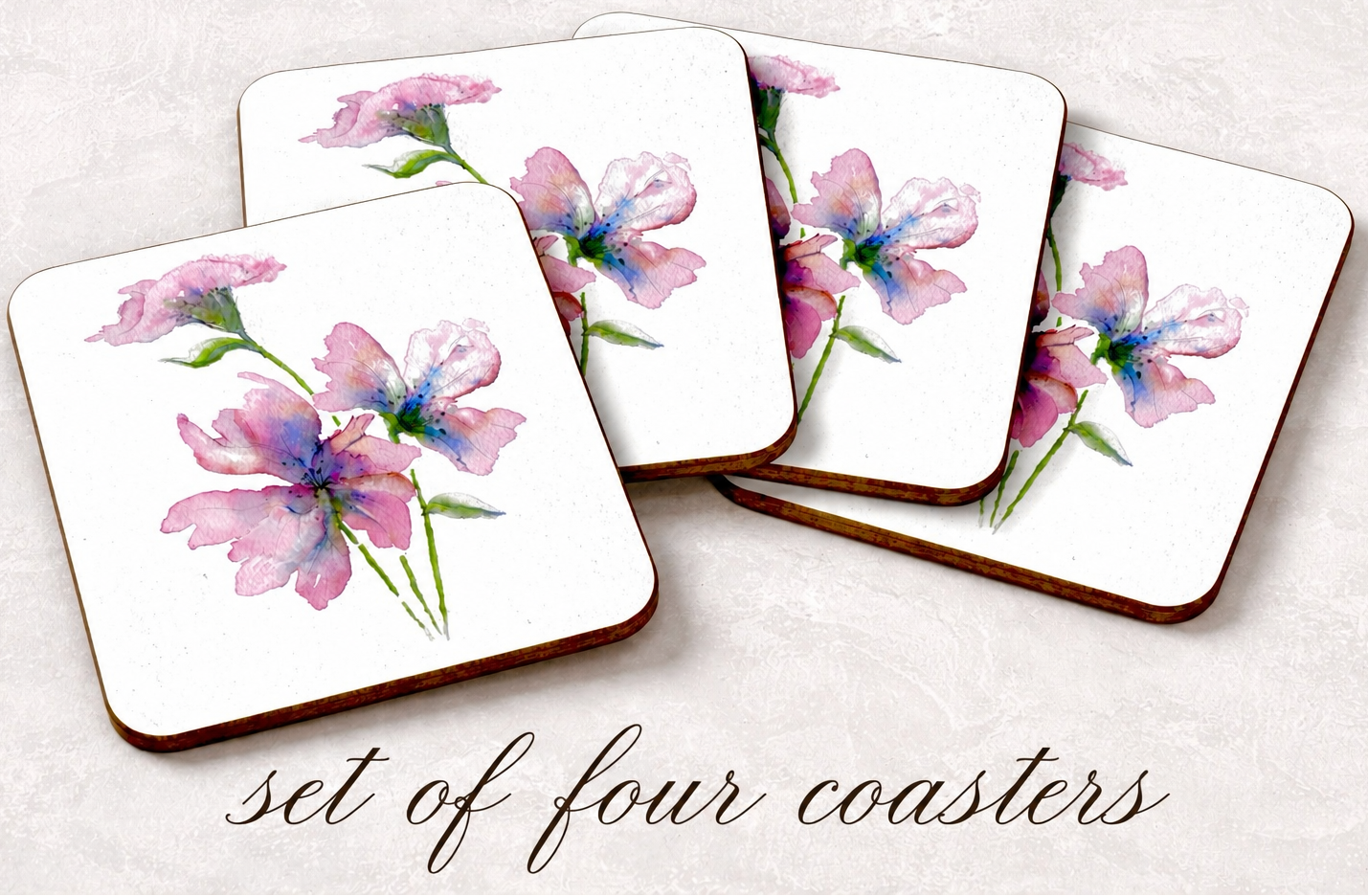 Set of four floral coasters on a light background