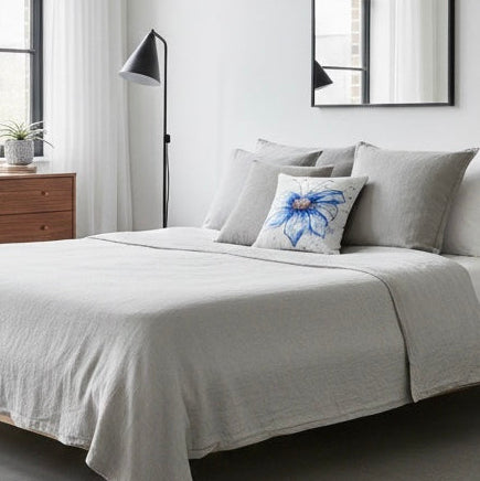 Minimalist bedroom: Blue cosmos canvas cushion on minimalist grey bedroom with modern decor