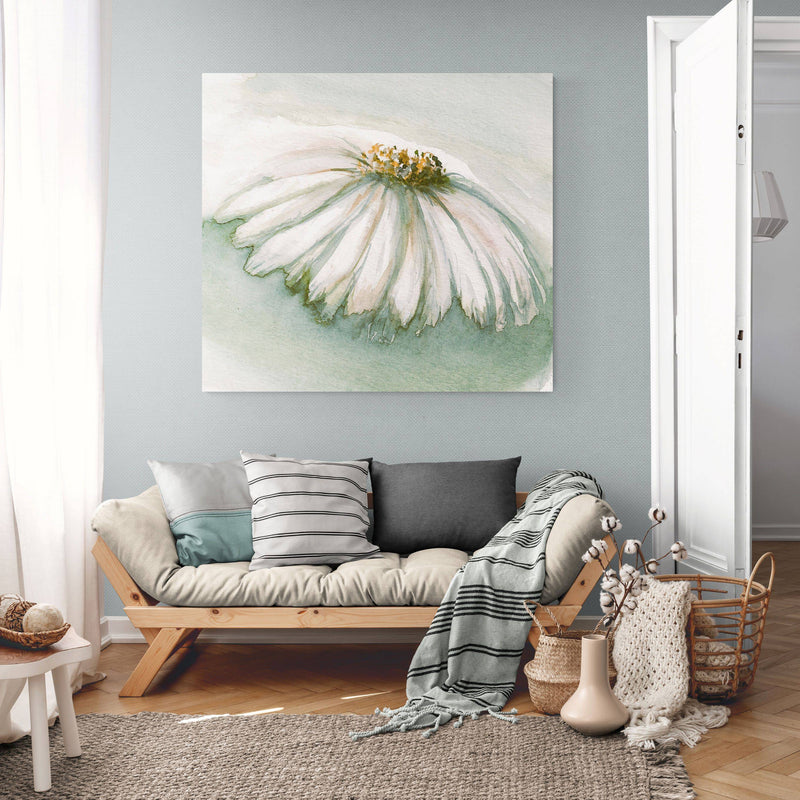Living room with a floral painting on the wall above a sofa.