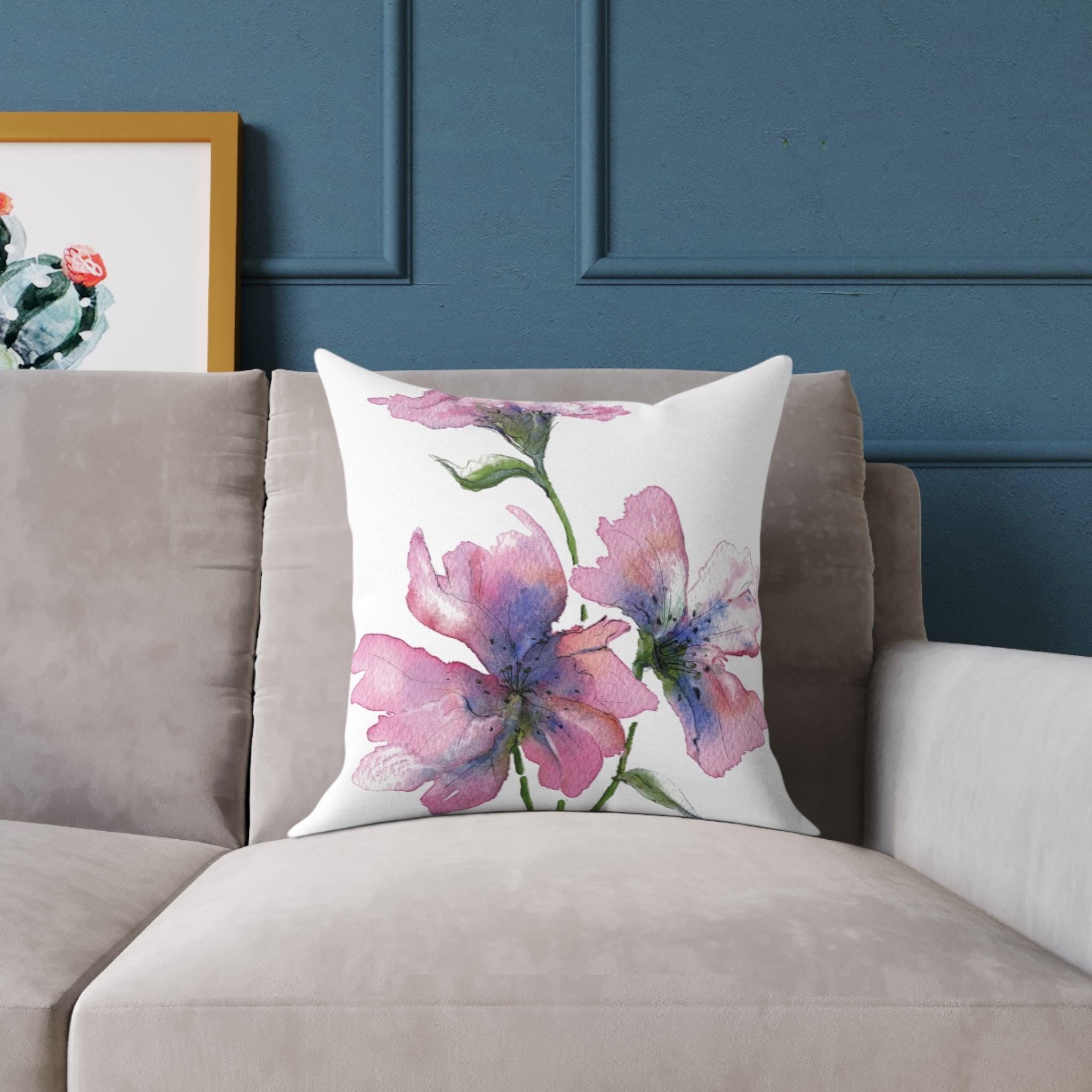 A Gentle Bloom floral cushion on grey sofa - soft pink watercolour botanical home decor