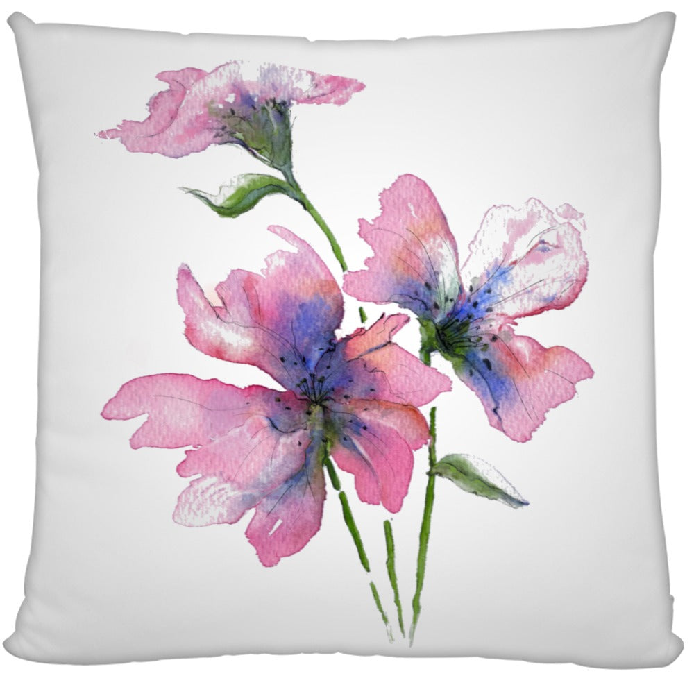 Decorative pillow with pink and blue floral design on a white background