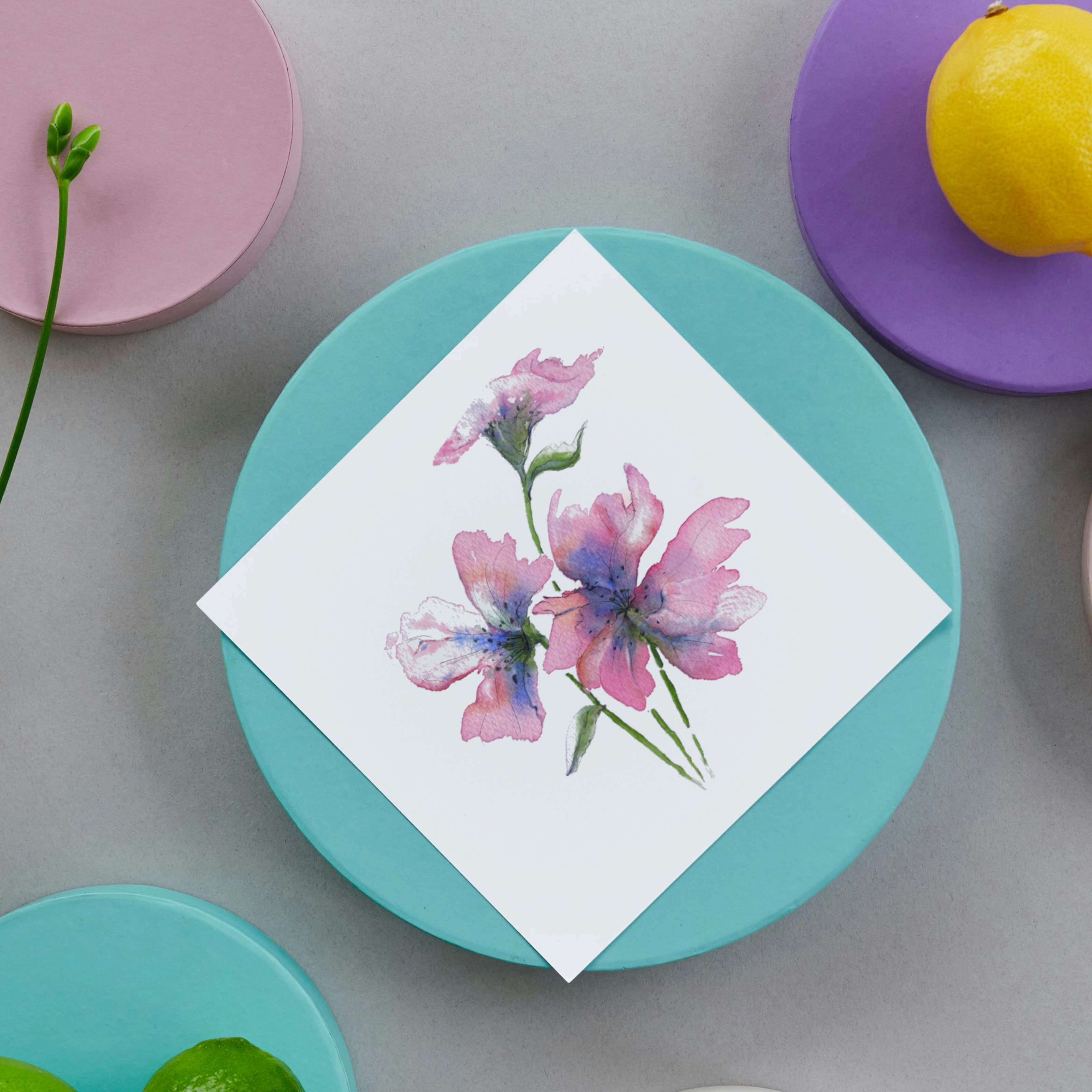 Pretty watercolour flower painting on square card with colourful circles and lemon