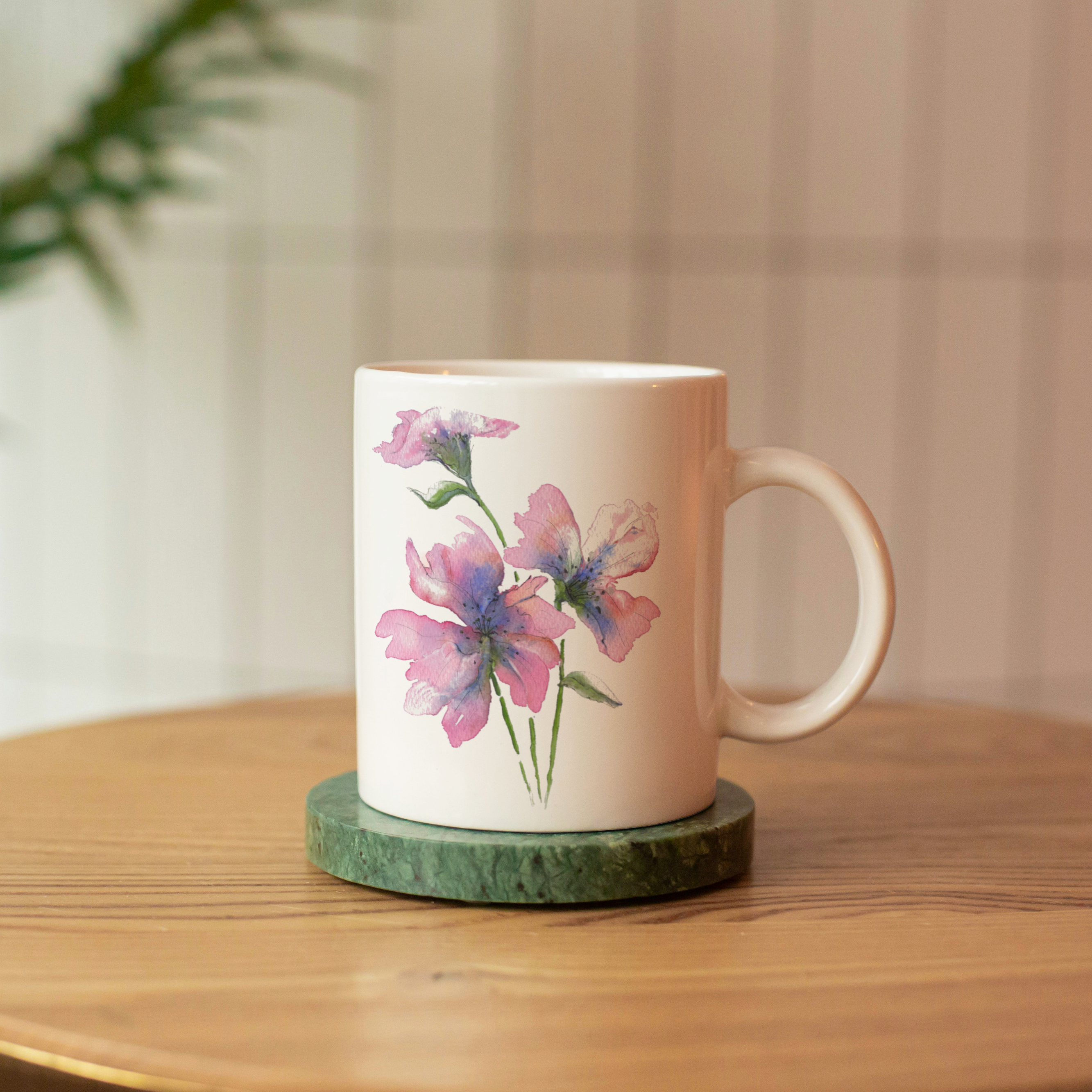 Mug with floral design on a wooden table